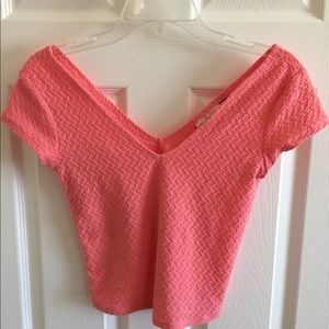 Summer crop top in salmon color.